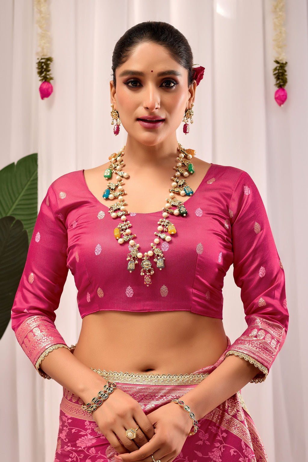 Elegant Rose Pink Floral Saree Featuring Traditional Motifs and Rich Zari Border for Festive Occasions